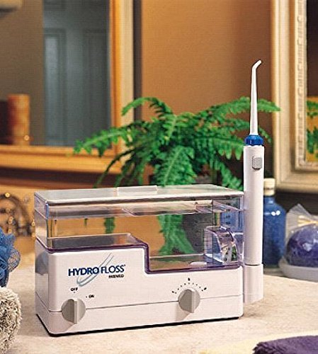 Hydro Floss Oral Irrigator - New Generation Hydro Flossing Machine - Hydromagnetics Lead to a Greater Reduction in Plaque and Tartar Buildup - Bonus Bottle of Tea Tree Oil By Toothy Grins